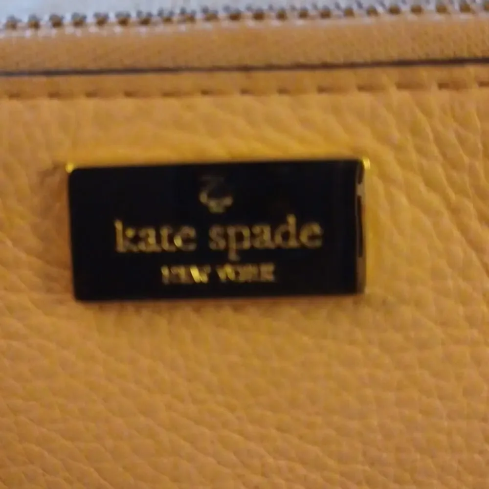 Kate Spade New York Pink Tone Wristlet.